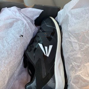 These are youth boy soccer and baseball cleats